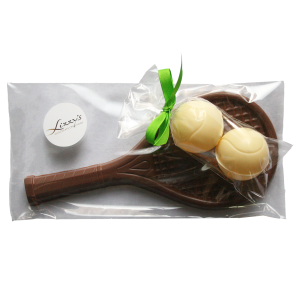 chocolate tennis racquet with two chocolate tennis balls attached