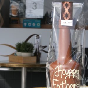Chocolate wine bottle with a personalised fathers day message on it