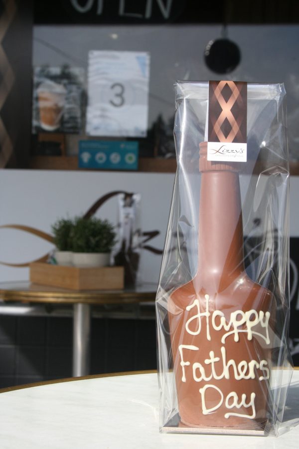 Chocolate wine bottle with a personalised fathers day message on it