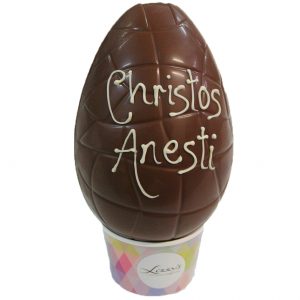 Greek easster chocolate egg with "christos Anesti" written on it