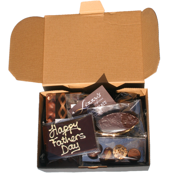hamper box full of chocolate items with a "happy fathers day plaque in the centre